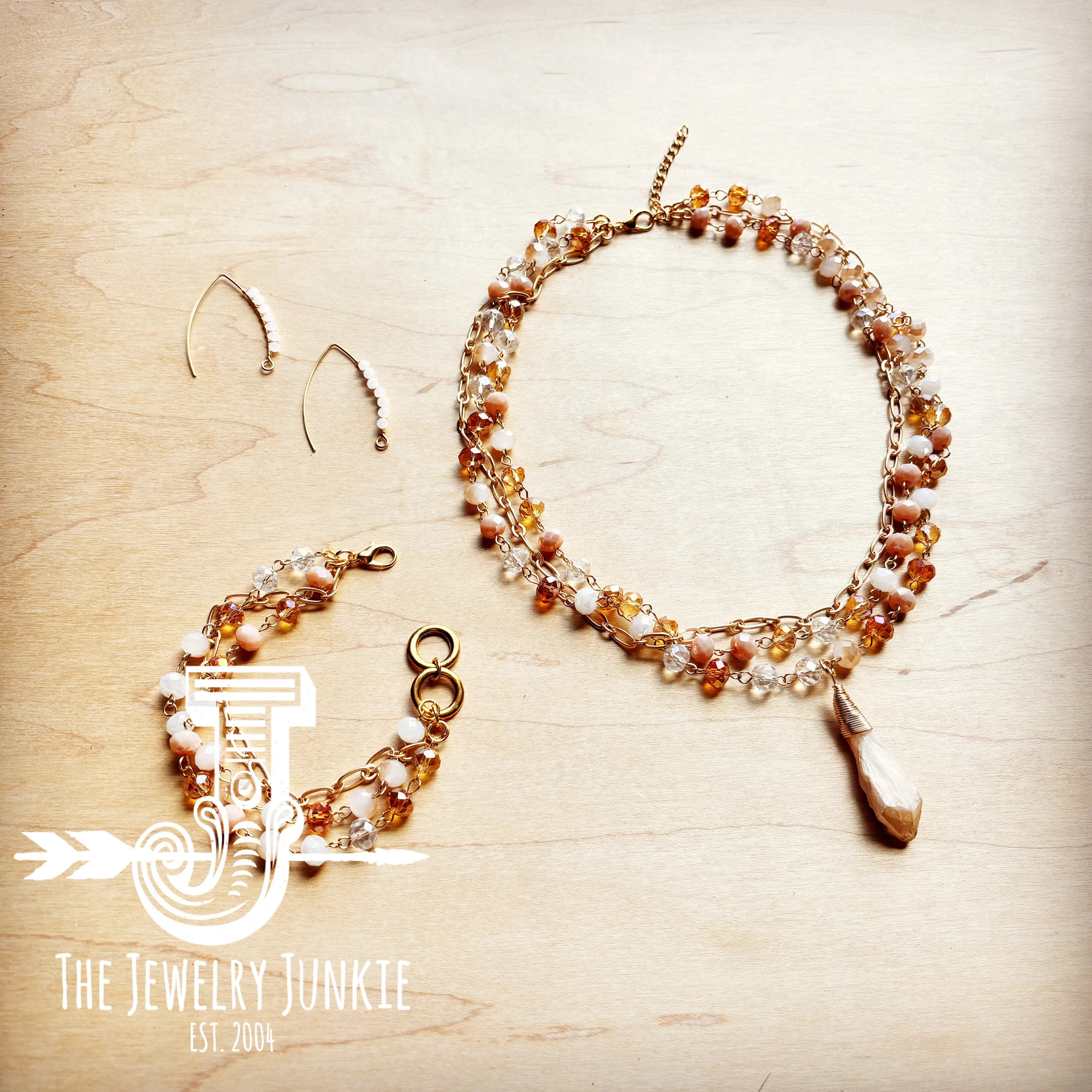 **Champagne Triple Strand Beaded Bracelet