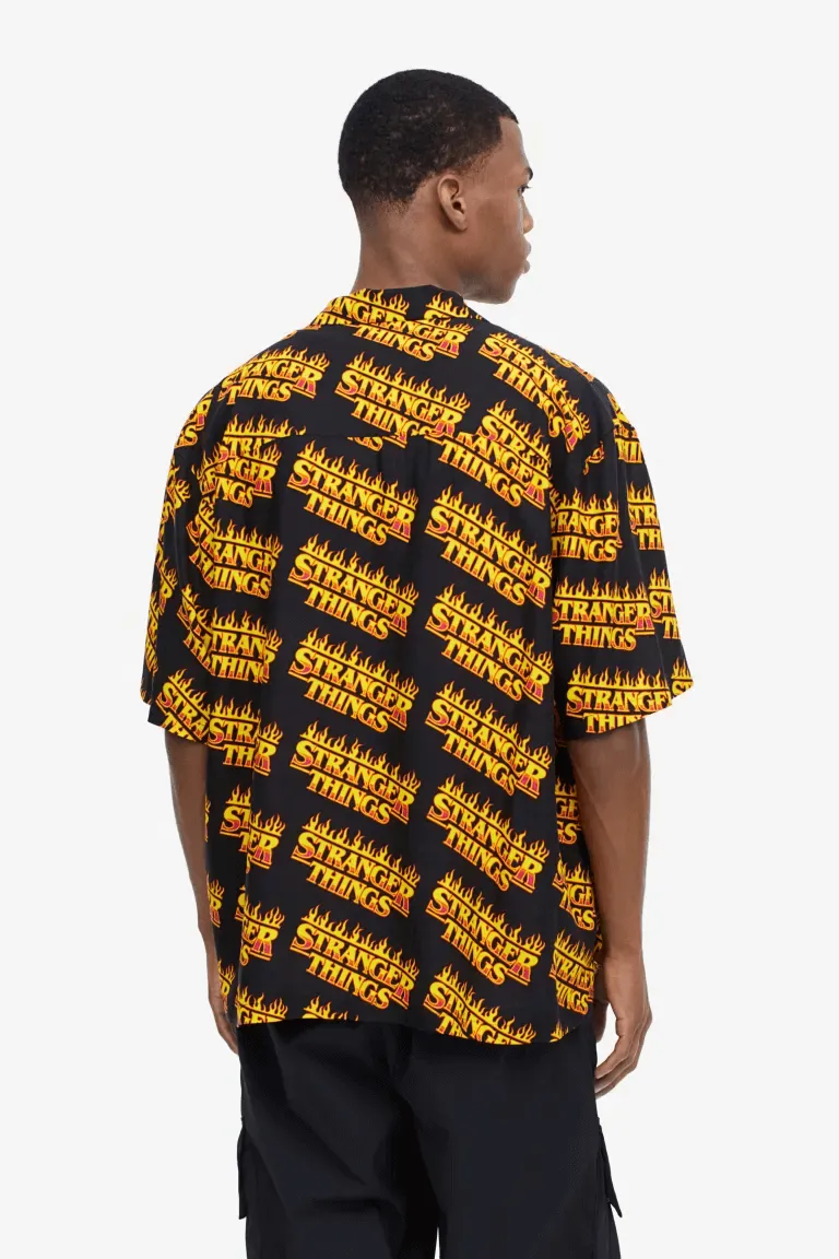 H&M x Stranger Things Relaxed Fit Patterned Resort Shirt, black/orange