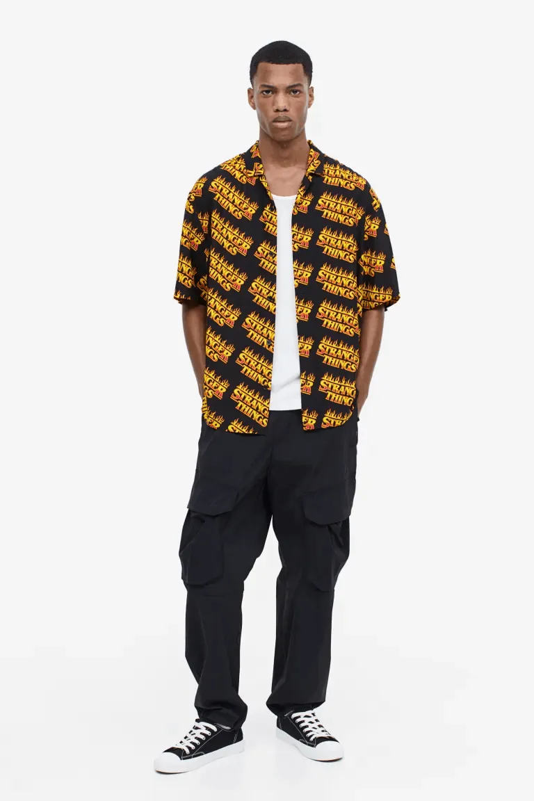 H&M x Stranger Things Relaxed Fit Patterned Resort Shirt, black/orange