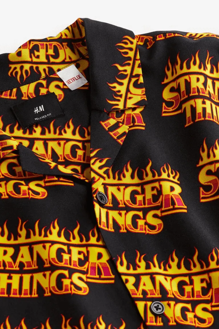 H&M x Stranger Things Relaxed Fit Patterned Resort Shirt, black/orange