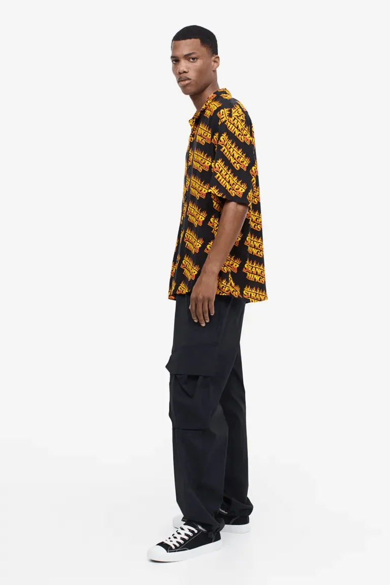H&M x Stranger Things Relaxed Fit Patterned Resort Shirt, black/orange